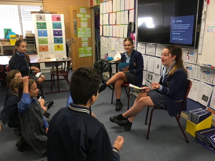 Gilroy students working with OLOL
