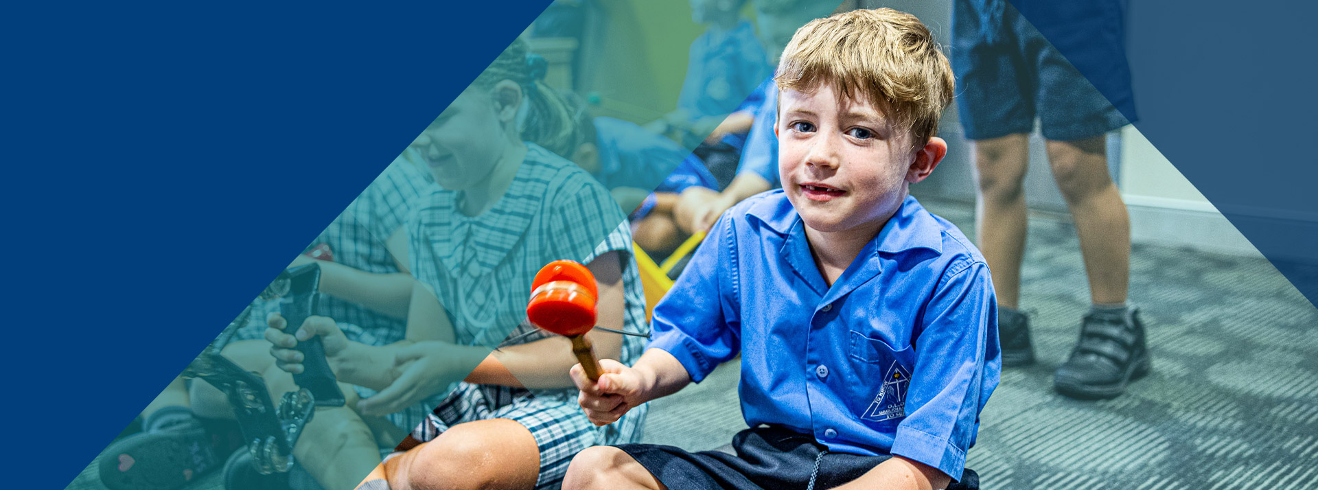 Student playing an instrument in the classroom at Our Lady of Lourdes Primary School Baulkham Hills South