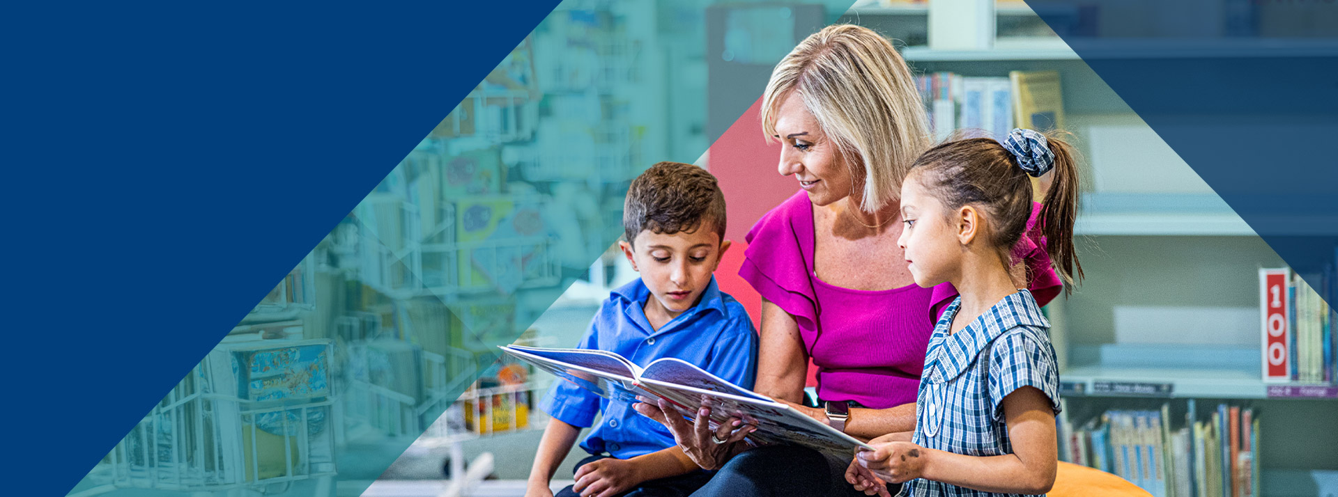 Teacher reading with her students in the library at Our Lady of Lourdes Primary School Baulkham Hills South