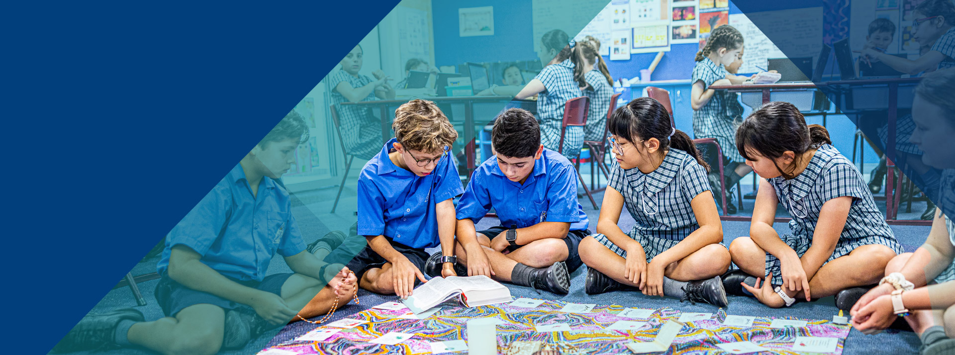 Students sitting together in the classroom at Our Lady of Lourdes Primary School Baulkham Hills South