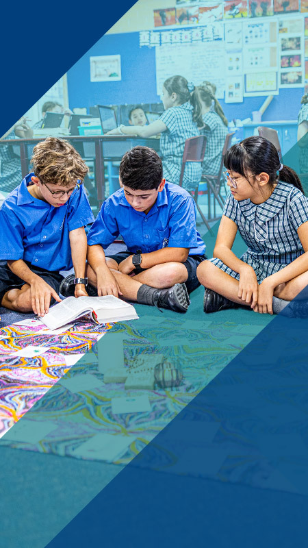 Students sitting together in the classroom at Our Lady of Lourdes Primary School Baulkham Hills South