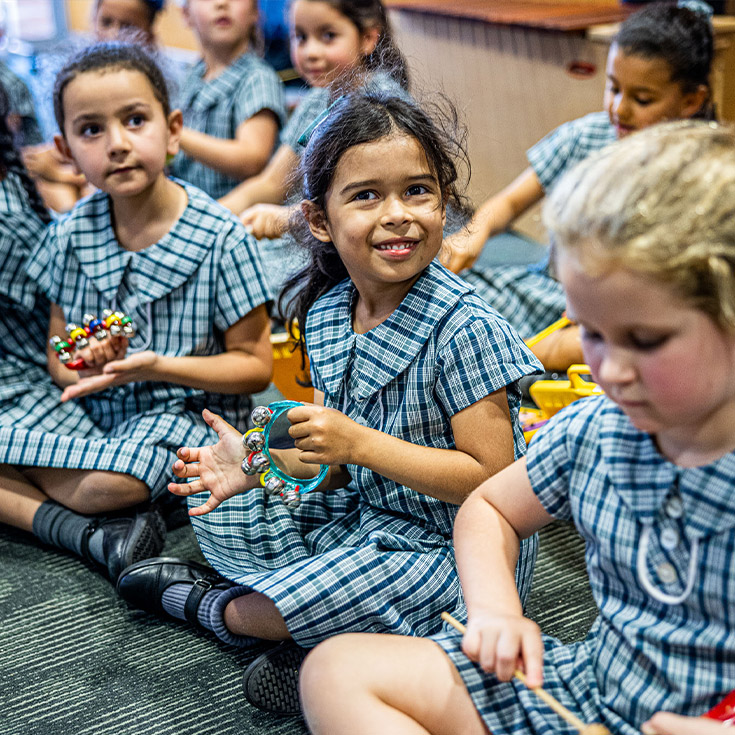 Students playing instruments in the classroom at Our Lady of Lourdes Primary School Baulkham Hills South